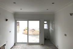 Kitchen re-plastered ceiling and walls, coving fitted.