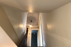 Stairwell walls and ceiling application of new Plaster.