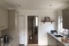 Kitchen re-plastered ceiling and walls, coving fitted.