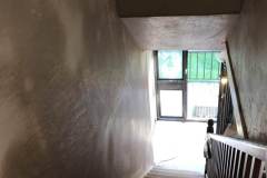 Stairwell walls and ceiling application of new Plaster.